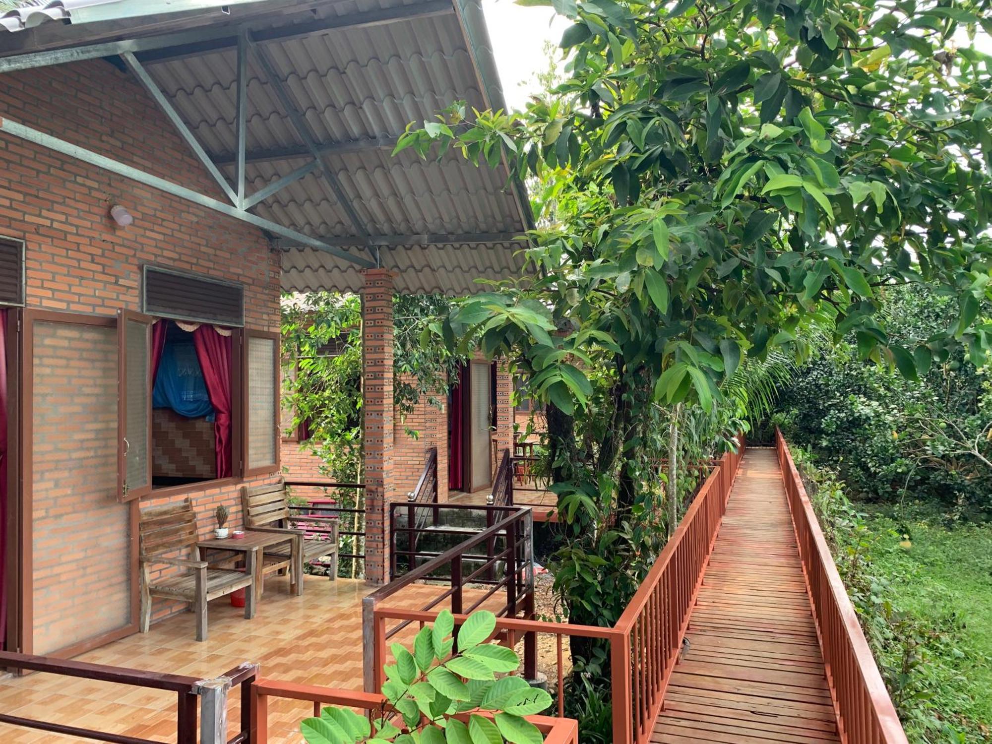 Gibbon Singing Home Stay Quan Tom Bagian luar foto